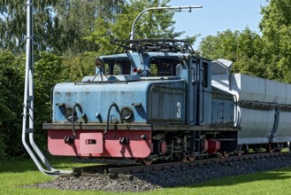 Vintage electric locomotive no. 3 from Krupp AEG with coal wagon for transporting lignite in