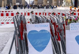 Demonstration, posters and barriers at the Brandenburg Gate, Berlin, Germany, Europe