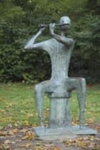 Sculpture Flute player by Walter Wadephul 1965, modern art, bronze, sitting, stool, flute, playing