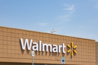 Walmart shopping center storefront against blue sky in Biloxi, Mississippi, USA, North America