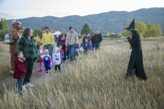 Lakewood, Colorado, Families enjoy the pre-Halloween Haunted Trail event at Bear Creek Lake Park. A