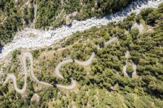 Aerial view of windy road in a mountain valley, Valais, Switzerland, Europe