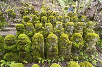 Moss-covered stone statues of rakans, the disciples of Buddha, Otagi Nenbutsu-ji temple, Kyoto,