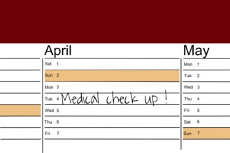 Symbolic image: Appointment diary with note for preventive medical check-up (English)