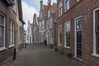 Alley with historic houses in the town of Blokzijl, province of Overijssel, Netherlands