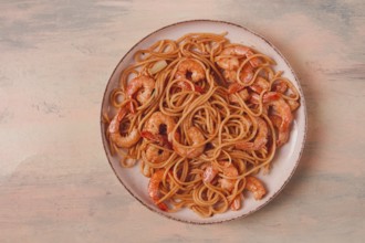 Spaghetti with king shrimps, with spices, top view, selective focus, homemade, no people