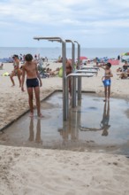 Shower on the beach after swimming in Swinoujscie, West Pomerania, Poland, Eastern Europe, Europe