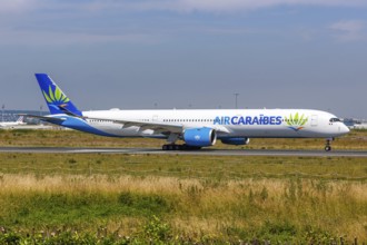 An Air Caraibes Airbus A350-1000 aircraft with the registration F-HMIL at Paris Orly Airport,