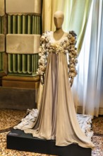 Wedding dress made of silk georgette with attached fabric flowers, 1989, exhibition of magnificent