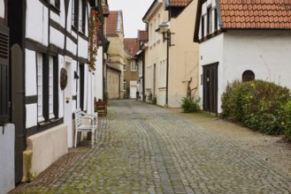 Gerichtsfuhlke alley with cobblestones and historic houses in Warendorf, district of Warendorf,