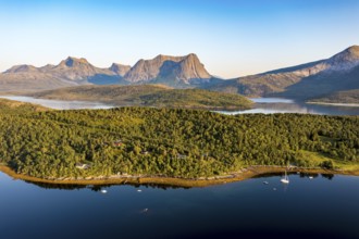 Aerial view over the fjord Efjord south of Narvik, seen at sunset, leisure boats anchor, holiday