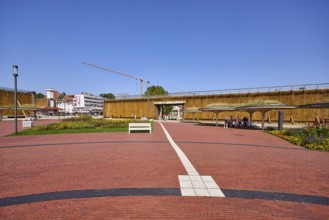 Park with lantern, bench, flowerbeds and graduation tower in Bad Salzuflen, Lippe district, North