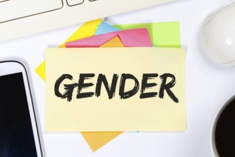 Gender as a symbol for gender-appropriate language Communication concept on desk in