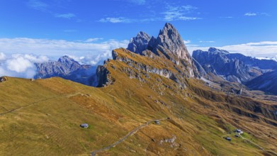 The Sas Rigais and Furchetta peaks of the Odle Group, drone shot, Val Gardena, Dolomites,