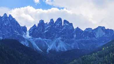 The peaks of the Geisler Group, drone shot, Sankt Magdalena, Villnöss Valley, Dolomites, Autonomous