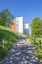 Walkway with barriers at high-rise apartment buildings a sunny summer day, Skövde, Sweden, Europe