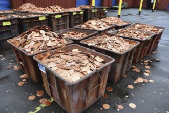 Scrap metal, scrap of stamped copper parts in containers at a scrap yard, recycling company for