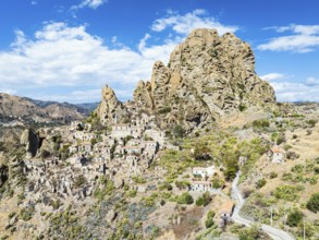 Mountains and Olive groves around Ghost Town from a drone, Pentedattilo Village, Calabria, Italy,