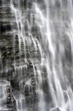 Water flowing down rocks, detail of a waterfall, Lisbon Falls, long exposure, near Graskop,