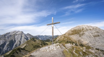 Summit cross on the summit of the Hahnkampl, behind summit Sonnjoch, Karwendel Mountains, Alpenpark