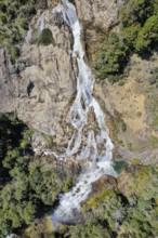 Aerial view of waterfall Cascada El Maqui near Puerto Guadal, Patagonia, Chile, South America