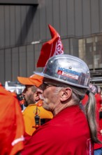 Steelworkers at a demonstration in front of the headquarters of ThyssenKrupp Steel Europe in