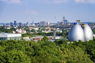 View of Dortmund city centre from the Deusenberg spoil tip, with the digestion towers of the Deusen