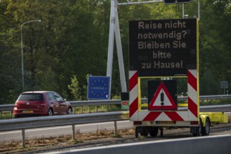 German-Dutch border at Emmerich-Elten, A3 motorway, signal board asks travellers to only make