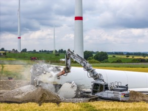 Demolished tower of a 20 year old wind turbine, in the Werl wind farm, 5 old Enercon E-66 turbines