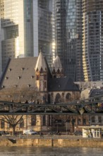 Skyline of the city centre of Frankfurt am Main, river Main, church St. Leonhard, dusk, Hesse,