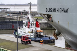 North lock in the overseas harbour of Bremerhaven, the vehicle transporter Durban Highway, under