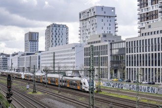 Railway line in Düsseldorf, along Toulouser Allee, residential area, office building, on former