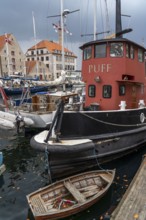 Ships and boats on Christianshavns Kanal, old district, at the same time very lively and hip