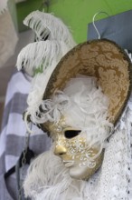 Venetian carnival mask in a shop window, Burano, Veneto, Italy, Europe