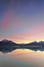 Sunset at the Forggensee near Füssen in the Allgäu, on the left the Säuling (2047 m), Bavaria,