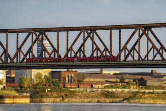 The railway bridge Duisburg-Hochfeld-Rheinhausen, over the Rhine, regional trains and many goods