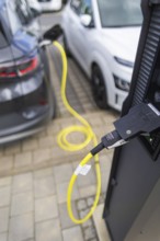 Electric cars at charging stations, Dresden, Saxony, Germany, Europe