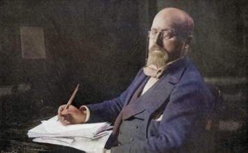 Henry James in his study. 1843-1916. American writer. From the book The International Library of