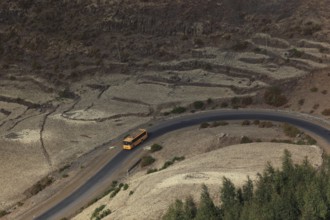 Bus on a winding road in the highlands between Mekele and Lalibela, Ethiopia, Africa