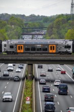 Rhine-Ruhr-Express, RRX train crossing the A3 motorway, traffic on 8 lanes, including the