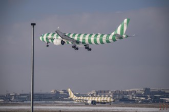 Condor Airbus A330-900 approaching Frankfurt Airport FRA and on the taxiway, Fraport, in winter,