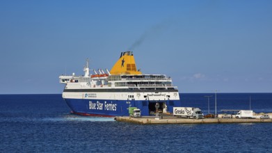 Large ferry of Blue Star Ferries at the harbour, ready for departure on clear and calm sea,