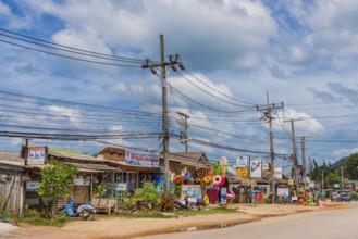 Street scene with general shop in the old town of Ko Lanta, dilapidated, row of houses, town,