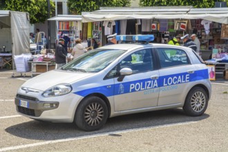 Police car at the market place in Policoro, Matera district, Basilicata, Italy, South Europe,