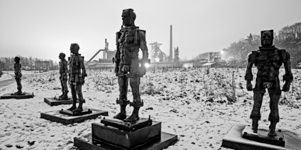 People made of iron, multi-part iron sculpture by Zbigniew Fraczkiewicz in front of the