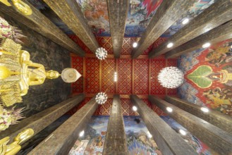 Frog's-eye view: coffered ceiling and golden Buddha statue, Bhumispara-mudra, Buddha Gautama at the