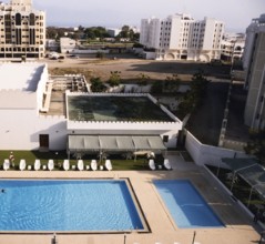 View of the swimming pool from the Holiday Inn Hotel, Muscat, Oman 1998