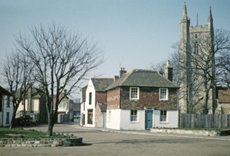 Church and historic buildings in the centre of the village, Lydd, Kent, England, UK 1959