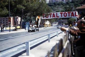 Formula One race at the 1961 Monaco Grand Prix, Bruce McLaren in the Cooper Climax racing car,