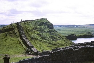 Visit by the Archaeological Society to Hadrian's Wall, Northumberland, England, UK West of Mile